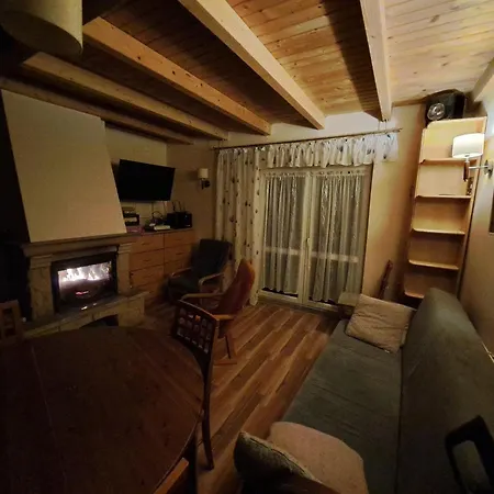 Dom wakacyjny Dom Drewniany Z Ogrodem *