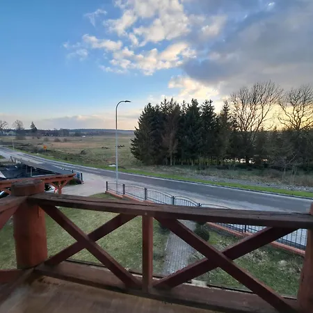 펜션 Dom Drewniany Z Ogrodem 슈체시네크